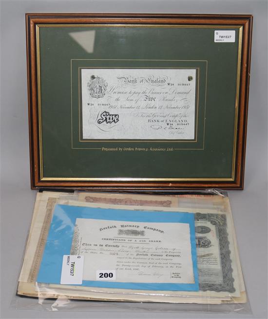 Scripophily, including a framed Bank of England five pound note, various bond and share certificates, etc.